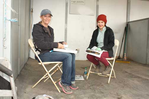 Farrier Meredith Clark and assistant farrier Shauna Malhoun.