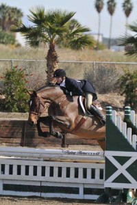Jenny Karazissis on course riding the bay horse Bay Lane.