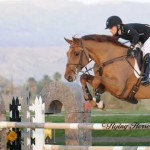 Ashlee Bond and Cadett 7 clear a massive oxer.